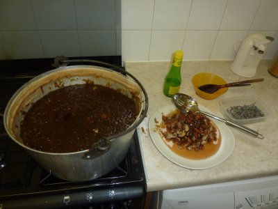 Fish out the plum stones from the finished Plum and Lavender jam  @ www.jamesandtracy.co.uk