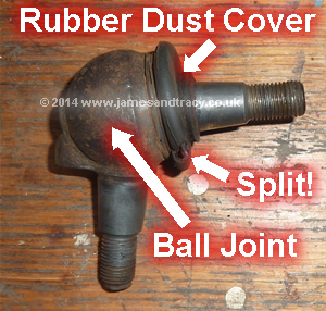 A split rubber dust cover on a Mercedes front suspension lower ball joint that will soon fail